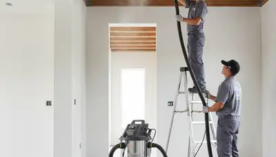 Technician cleaning air ducts for AC system in Durham NC home by Five Star Cooling